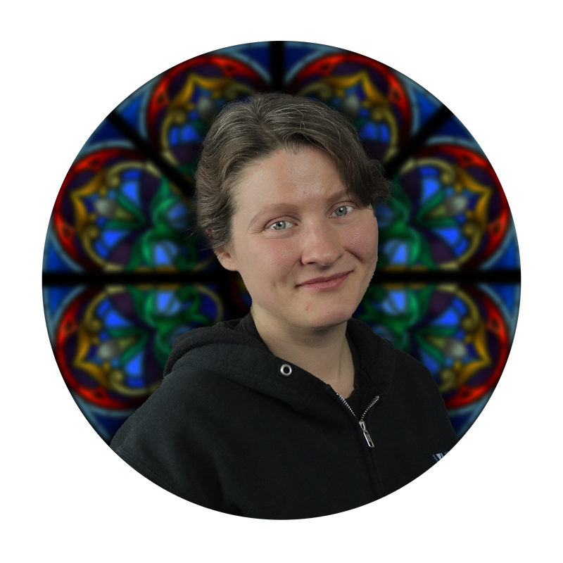 Caitlin Nicholson, Field Apprentice at Willet Stained Glass Studios, with stained glass background featuring intricate designs and vibrant colors.