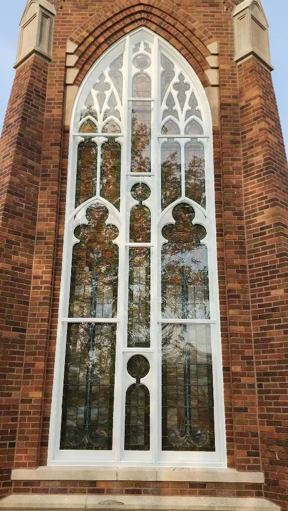 Protective glazing and architectural window design in a historic building.